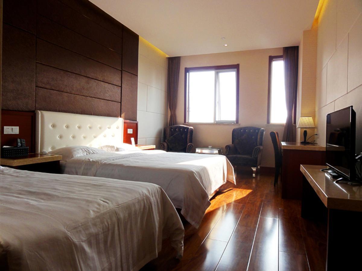 Qingdao Hua Qi Kaiserdom Hotel Exterior foto