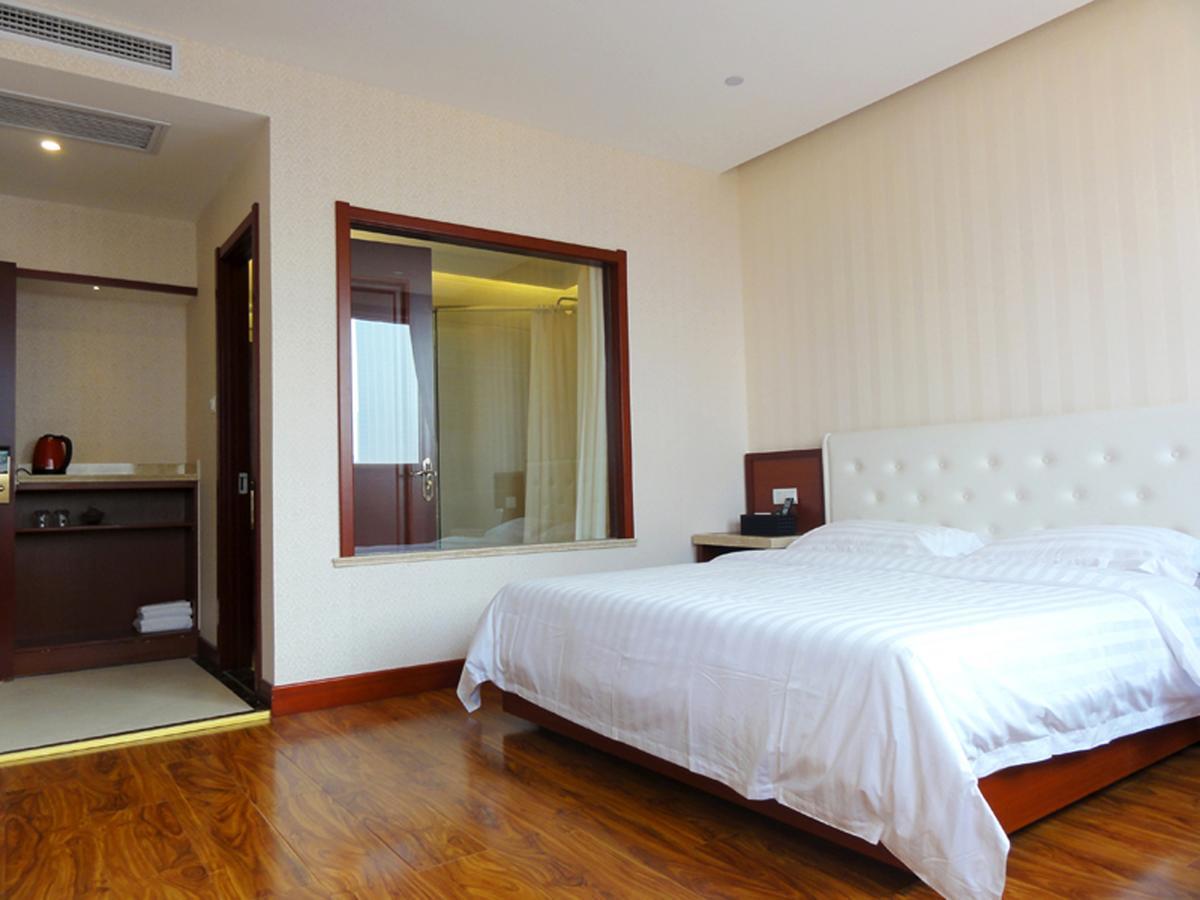 Qingdao Hua Qi Kaiserdom Hotel Exterior foto